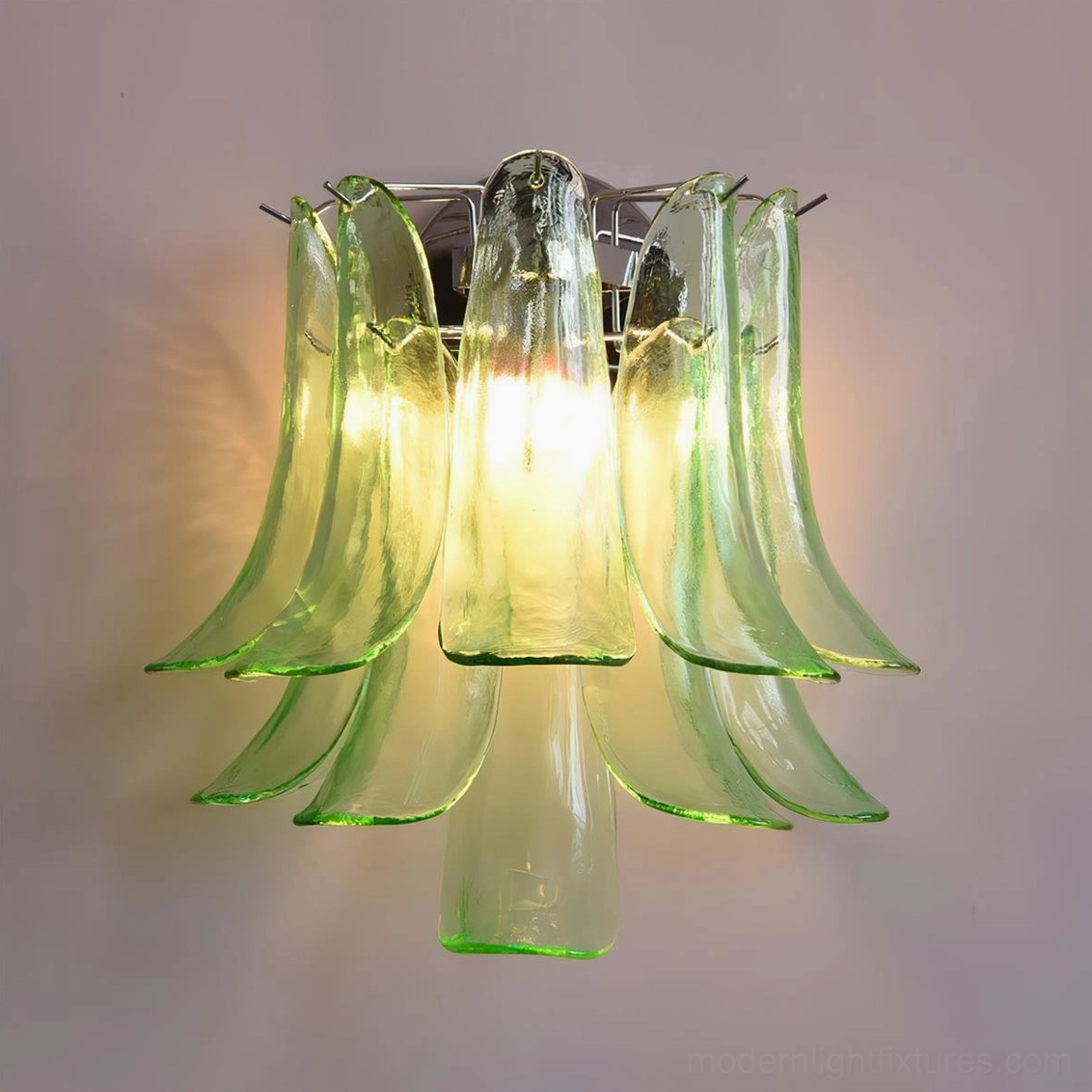 Green flower petal wall sconce, vintage-style clear green glass petal design with chrome fixture, studio lighting