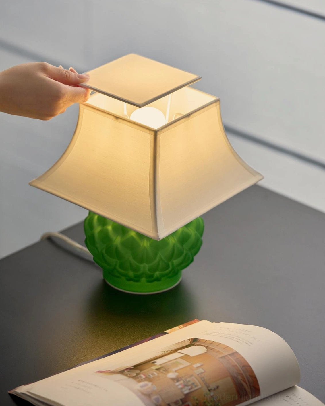 Green Petaluxe table lamp with detachable white shade showing E14 and G9 socket configuration and internal bulb