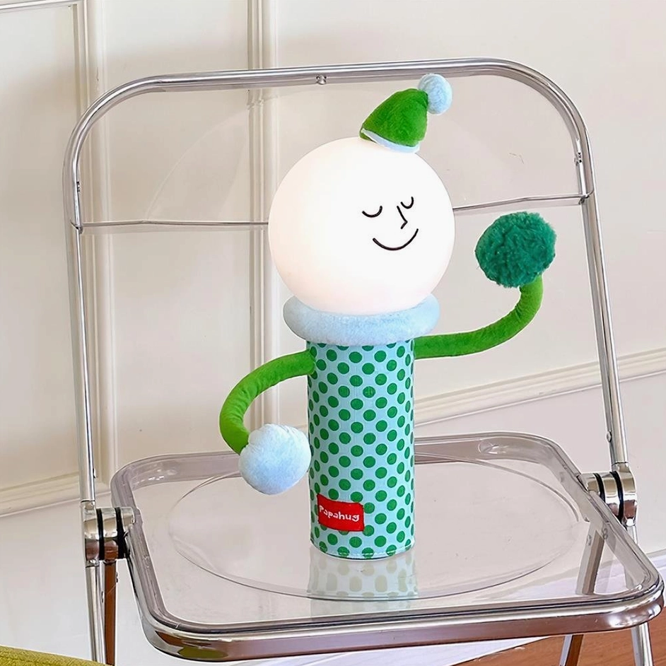 Green polka dot character table lamp with flexible poseable arms and integrated LED