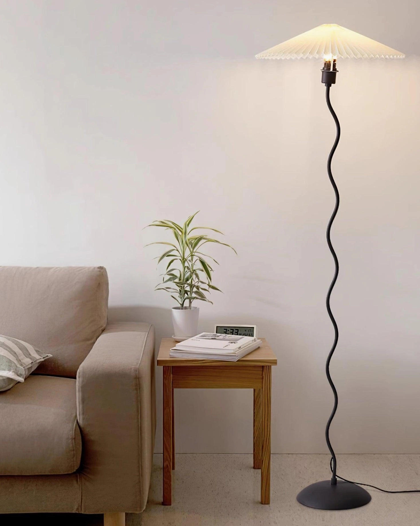 Green squiggle wave floor lamp in contemporary room - artistic modern lighting for styled interior spaces