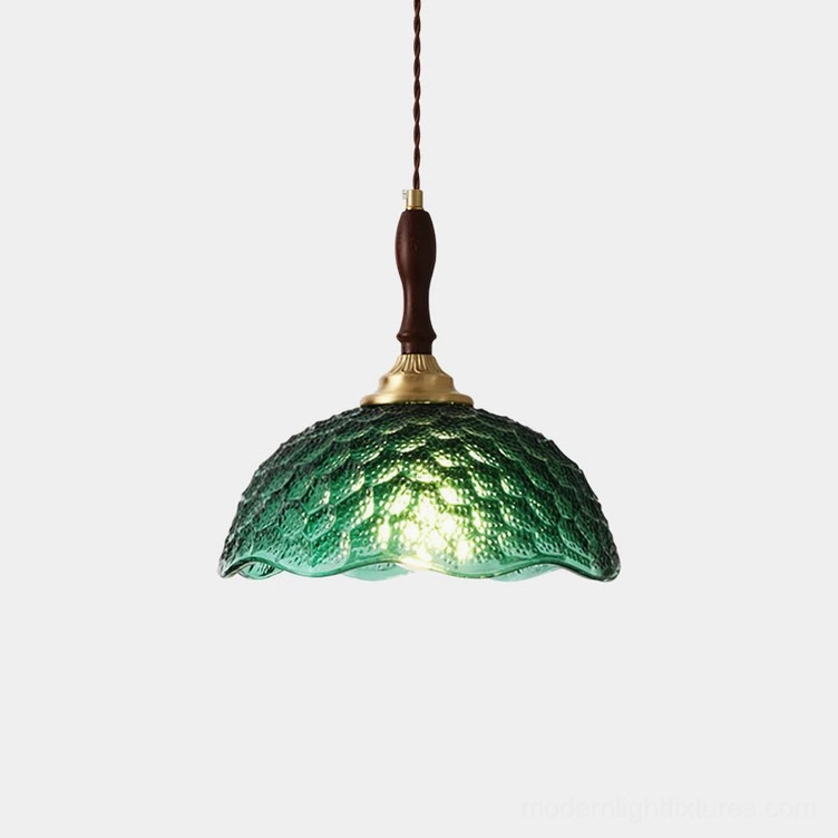 Grevia vintage scalloped glass pendant lamp with dark green embossed shade, brass hardware, studio front view