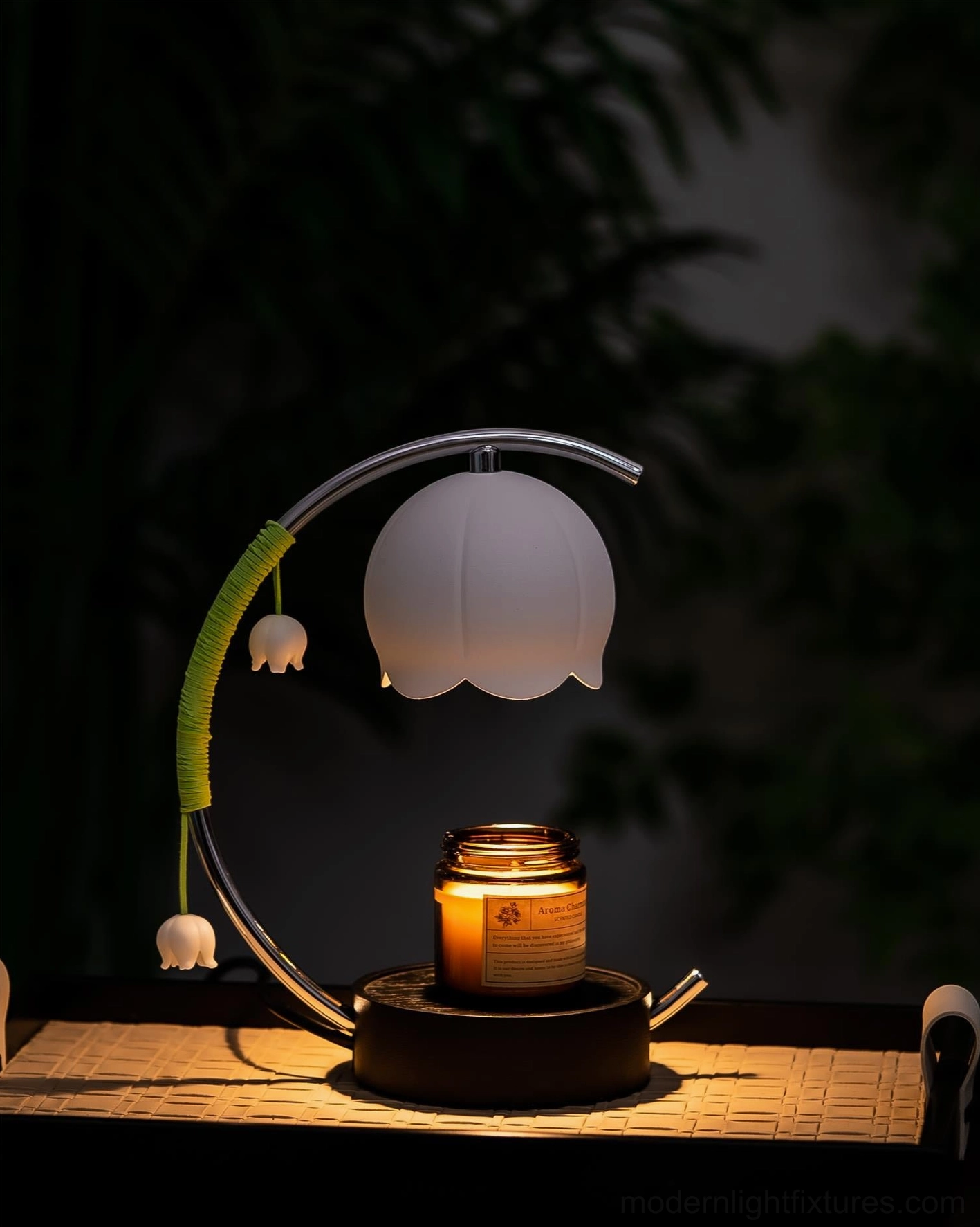 Lily of the Valley Candle Warmer Lamp with grey shade and sealed glass candle jar in dim low-key warm lighting