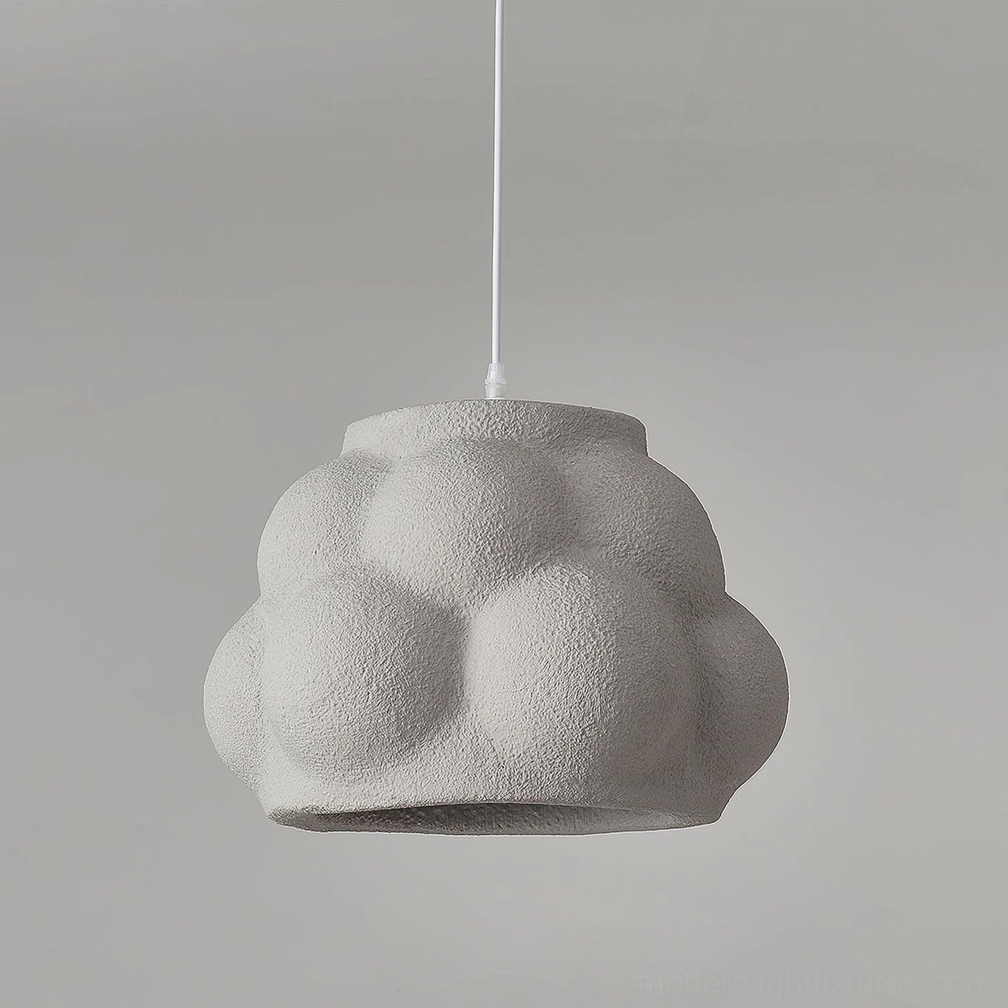 Soft grey wabi-sabi cloud pendant light in Scandinavian minimalist interior design setting