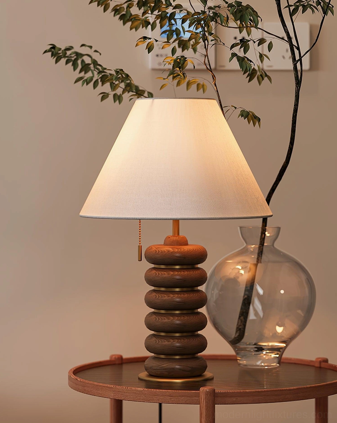 Stacked wood table lamp three-quarter view living room side table with clear glass decorative vase