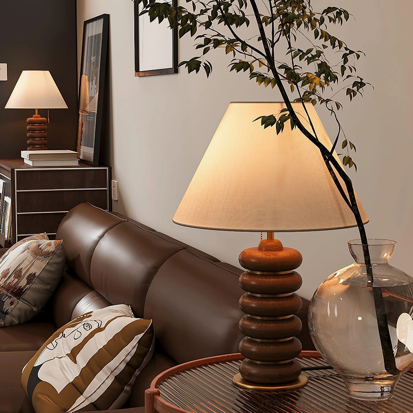 Stacked wood table lamp three-quarter view vintage living room lounge with brown leather sofa