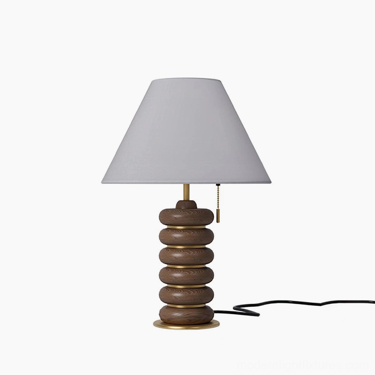 Walnut stacked wood table lamp gold metal base white background studio showcase light grey shade