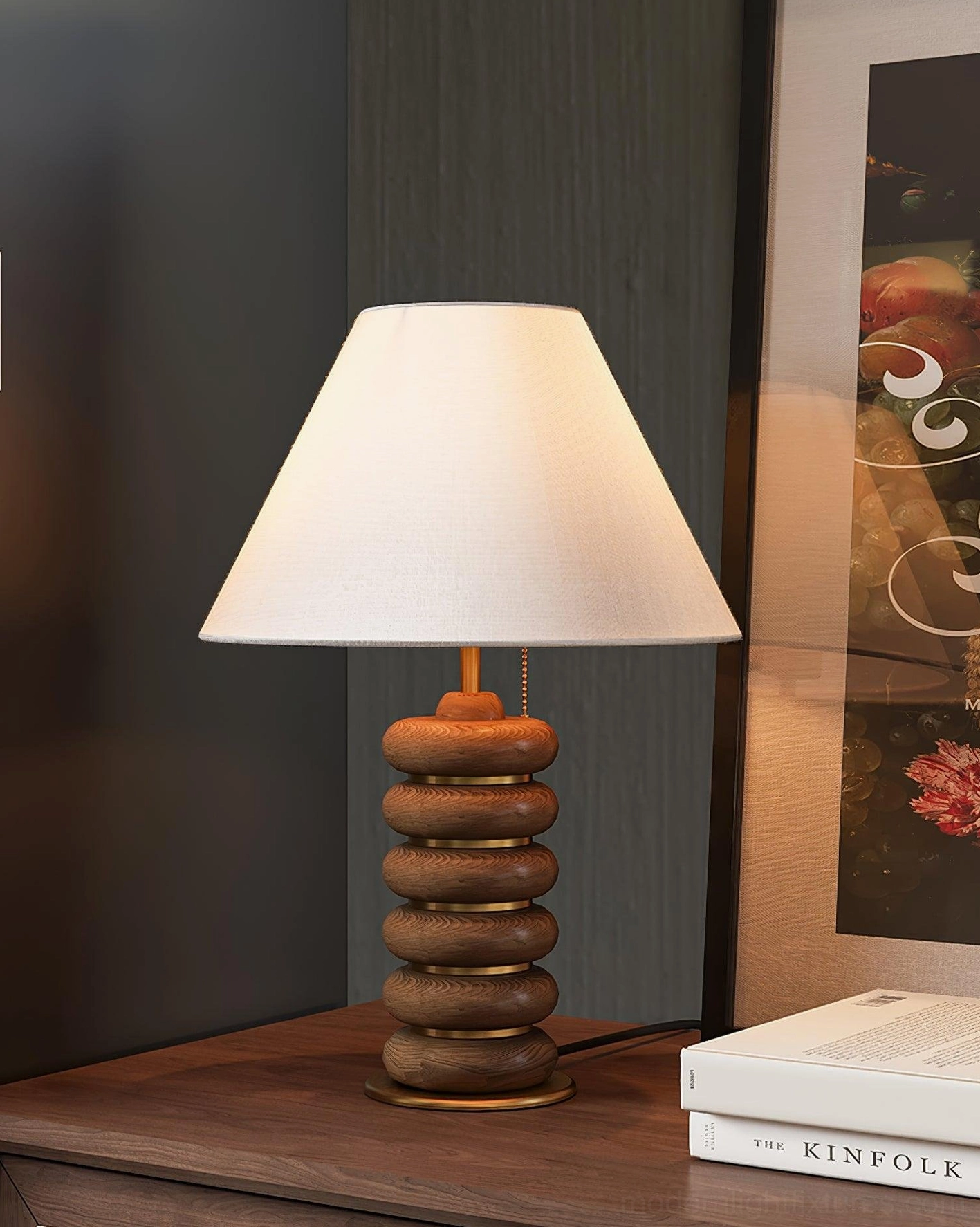 Walnut stacked wood table lamp home side table with decorative books and wall art styling