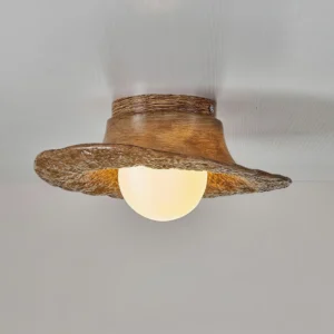 Grima hat ceiling light with warm wood brown finish, close-up detail of uneven textured brim design