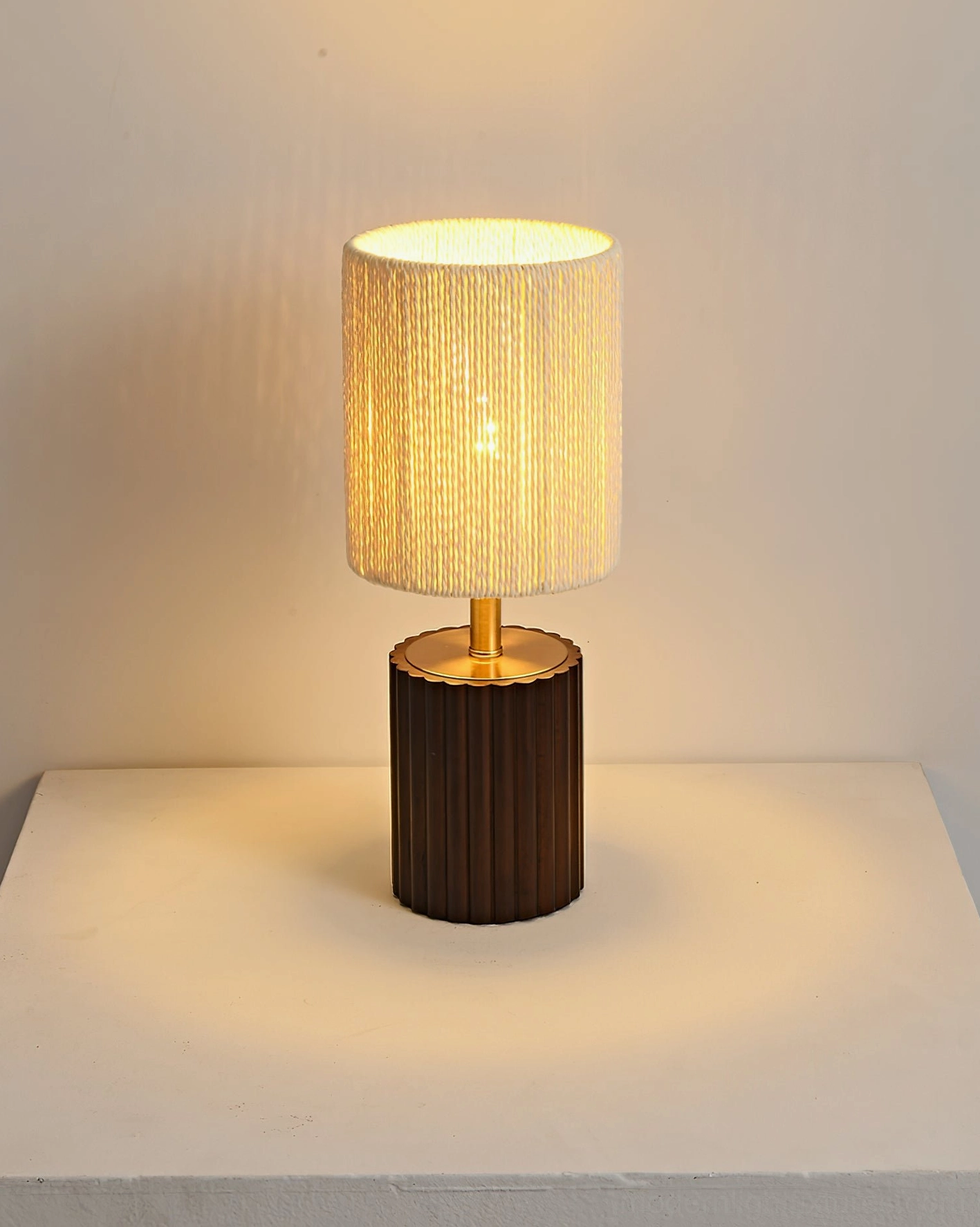 Modern grooved wooden base table lamp with textured beige shade, detailed front view