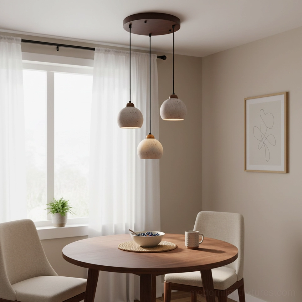 three travertine pendant lights grouped dining area warm neutral interior