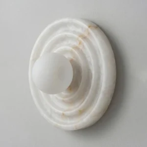 Grove Alabaster Wall Sconce - natural stone veining and ripple texture detail close-up side profile