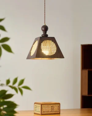 Grove geometric rattan pendant lamp warm glow indoor dining room tabletop scene