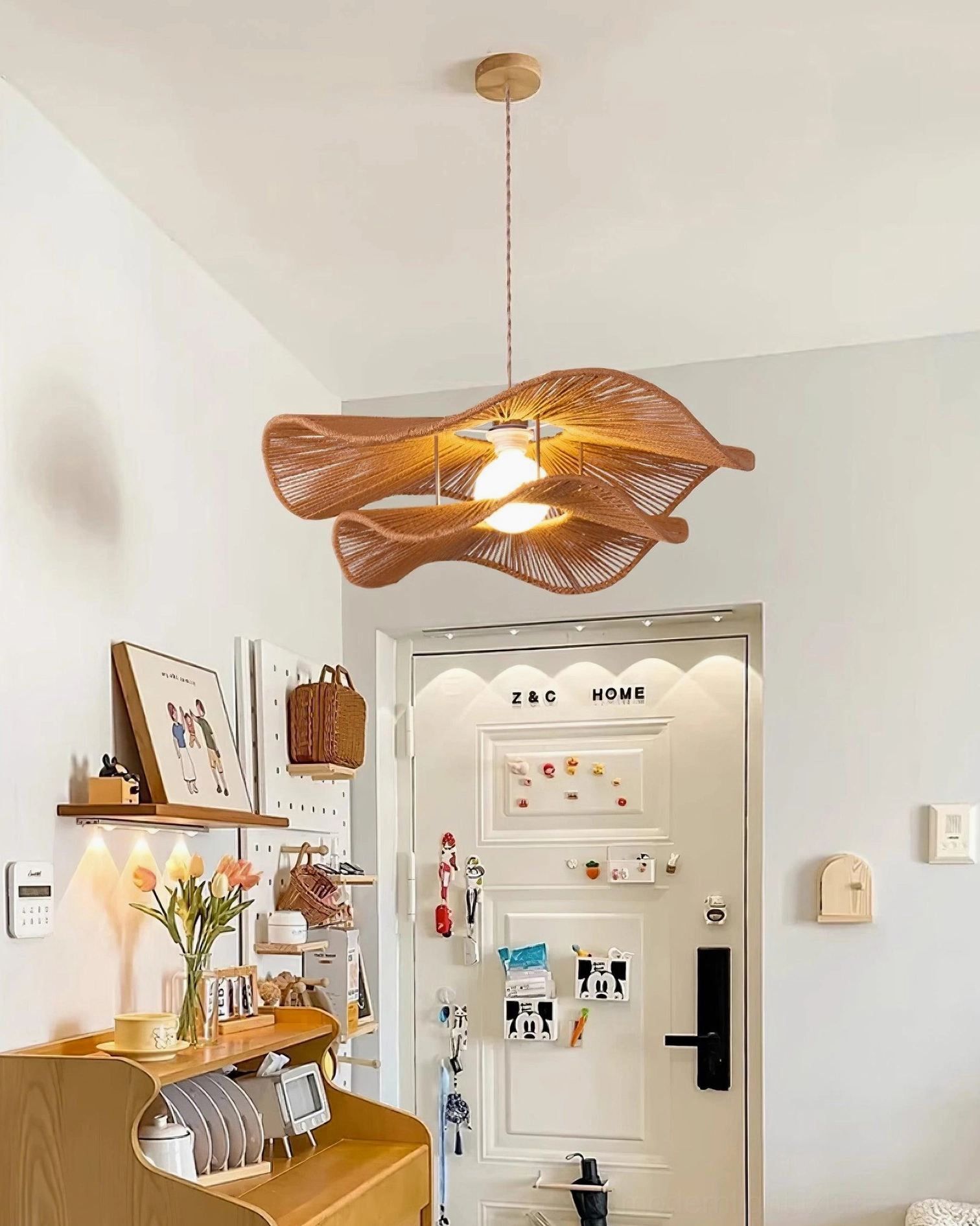 Gunilla woven hemp pendant light in home entryway hallway with boho warm natural style and organic decor elements