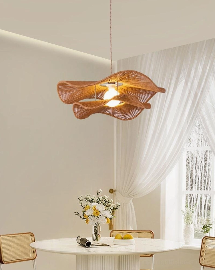 Gunilla woven hemp rope pendant light in styled interior setting with complementary minimalist furnishings and decor