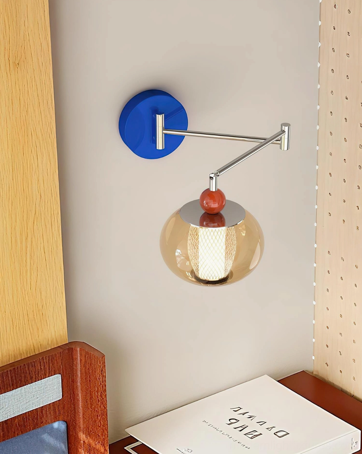 Gyro wall lamp with adjustable swing arm in home office study corner with warm lighting