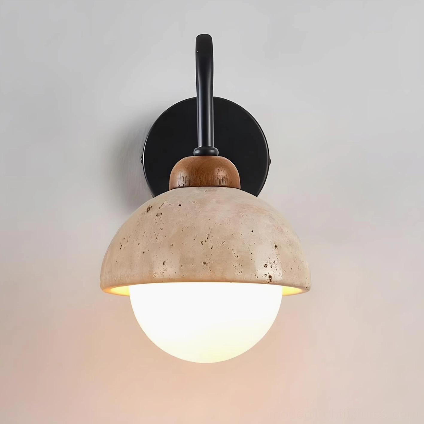 Halcyon Dome Wall Sconce in Beige travertine shade showing neutral aesthetic and warm diffused light output