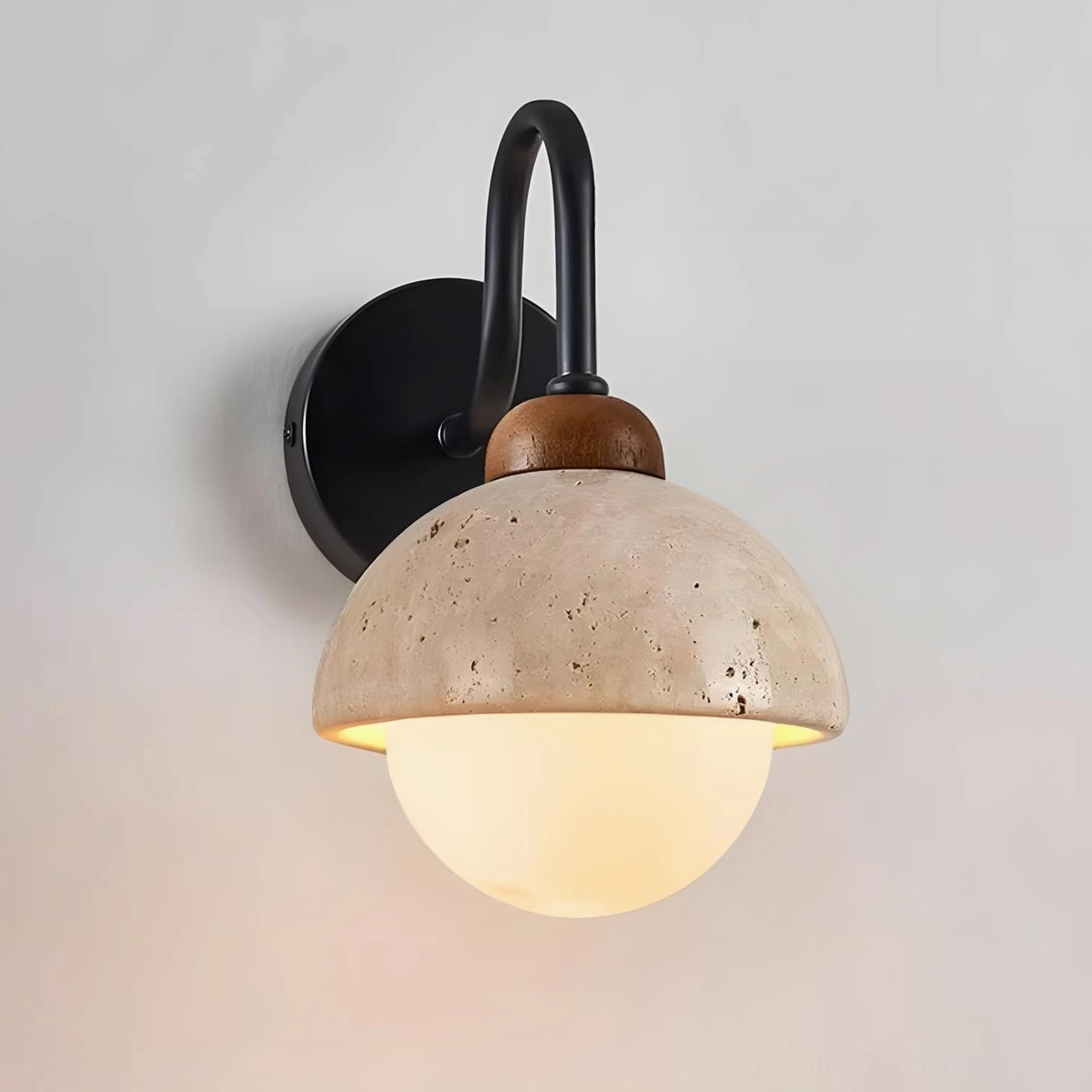 Halcyon Dome Wall Sconce in Black color option with matte finish metal arm and frosted glass dome on white background