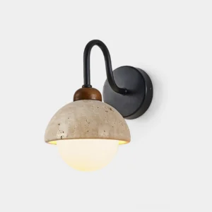 Halcyon Dome Wall Sconce with travertine stone dome and matte black metal arm, front view on white background