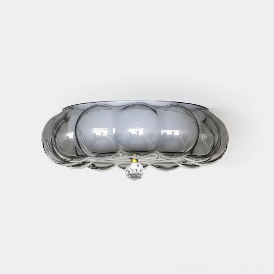 Hallowmere sculptural glass ceiling light with cloud-form silhouette, smoke gray tone, featuring crystal accent detail on white studio background
