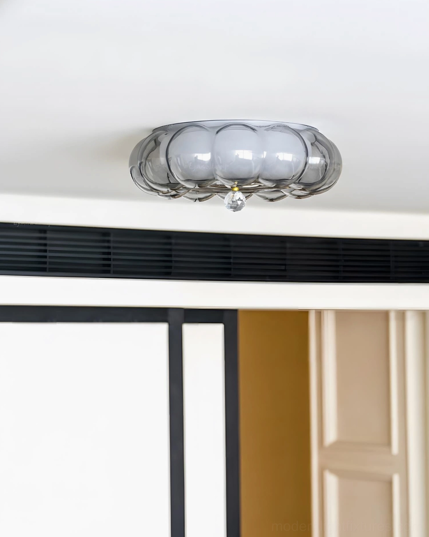 Side overhead perspective of Hallowmere smoky gray ceiling light with crystal hanging embellishment and sleek silhouette