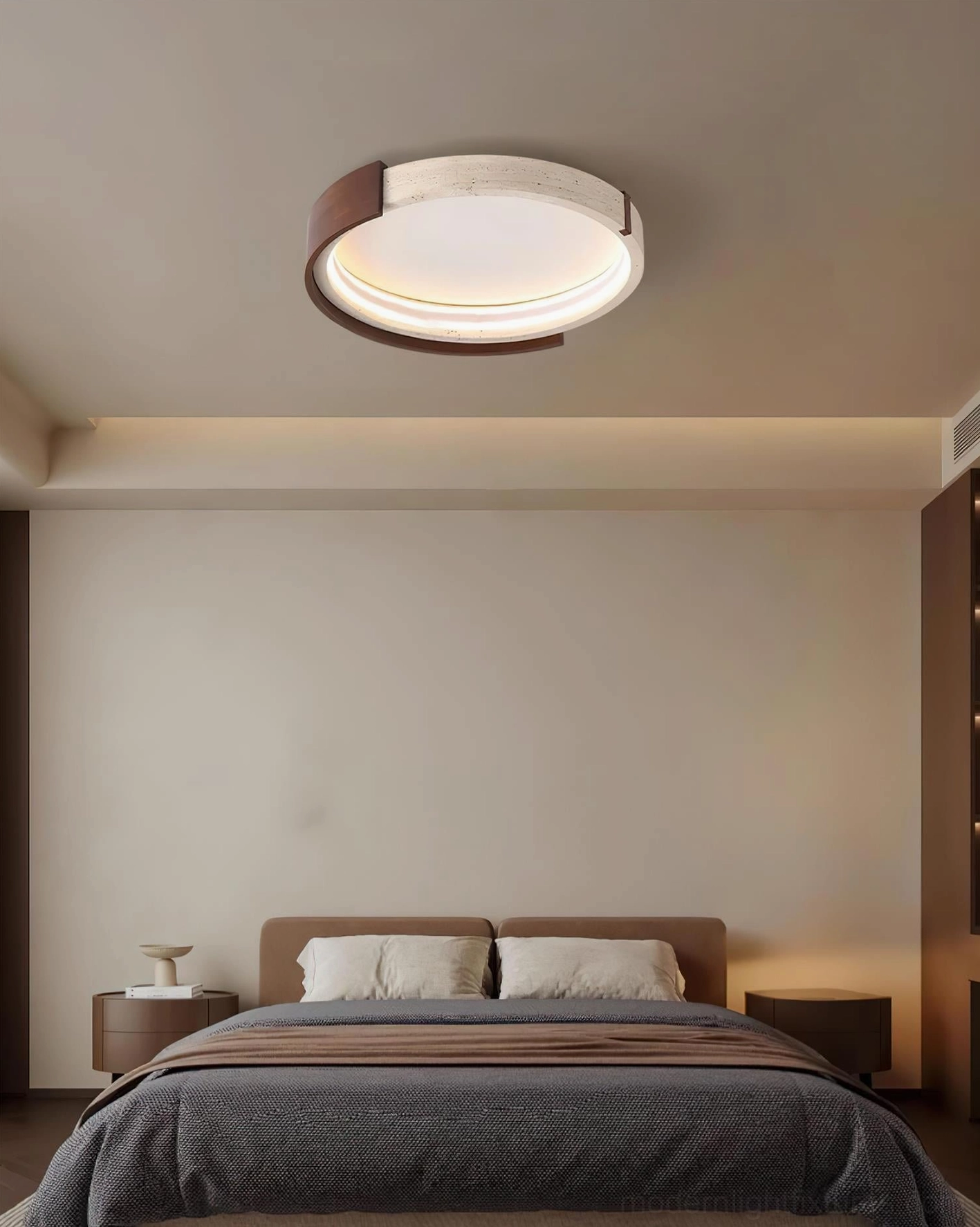 Halo travertine ceiling lamp in minimalist bedroom with neutral muted interior design palette