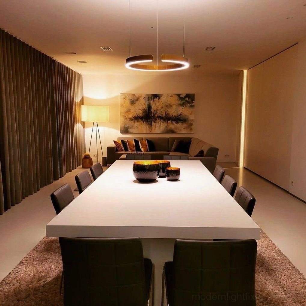 Halo LED ring pendant lamp close-up showing acrylic shade and diffusion quality of warm light