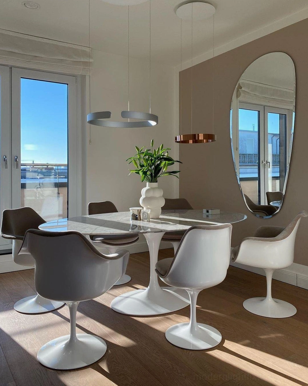 Halo ring LED pendant lamp in boutique commercial café restaurant design setting