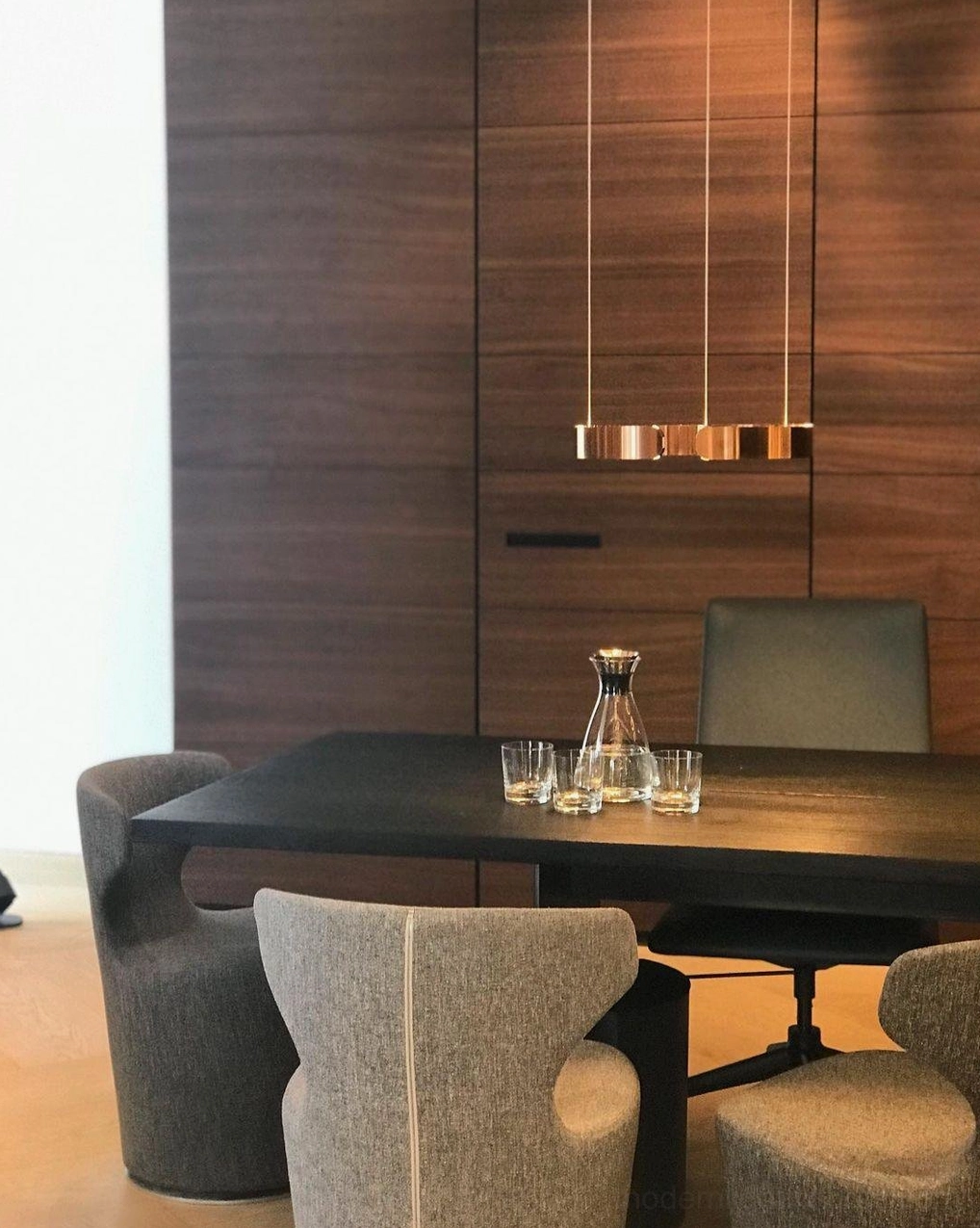 Halo ring pendant light complement to brass accents and transitional interior styling