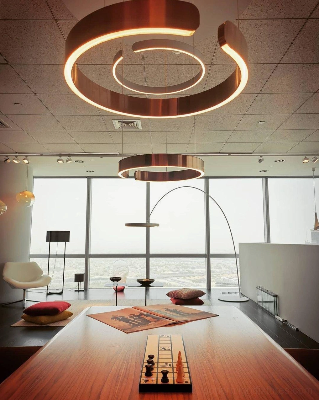 Halo ring pendant light enhancing contemporary bedroom ceiling with sophisticated pendant design