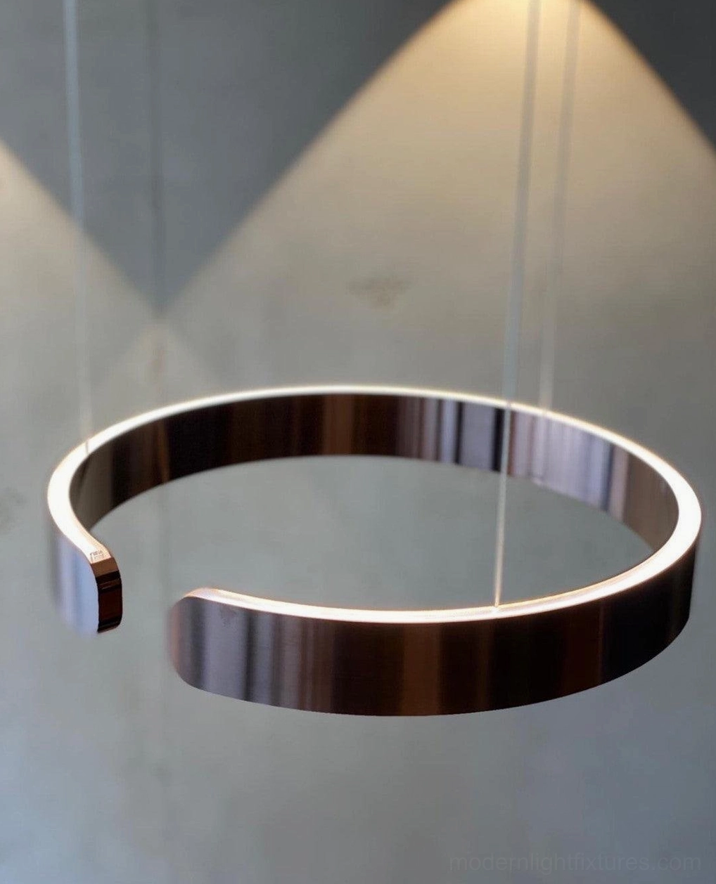 Halo LED pendant light creating emotional comfort and connection in living spaces with warm glow