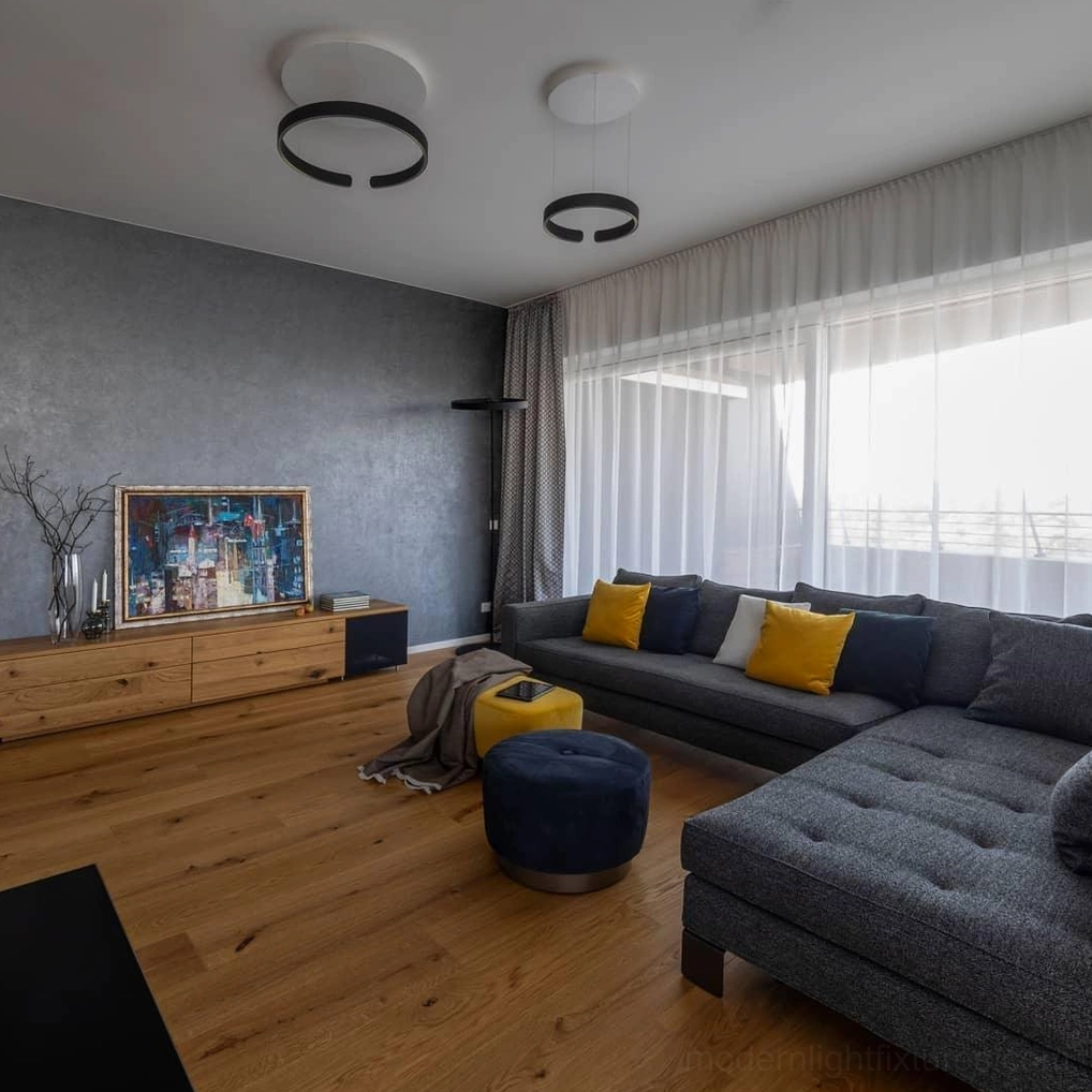 Halo LED pendant lamp with metal and acrylic construction in modern luxury interior setting
