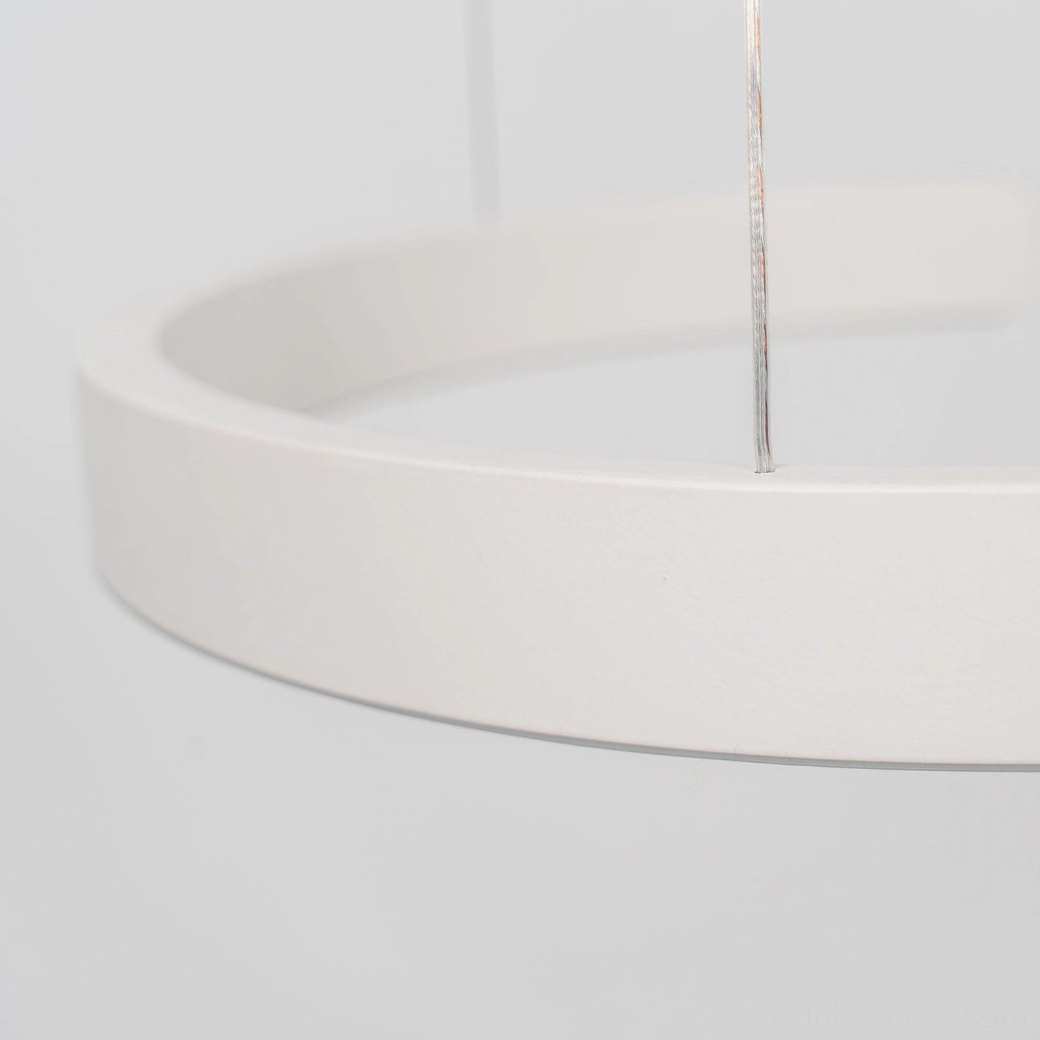 Halo LED ring pendant lamp creating sophisticated ambiance in luxury minimalist interiors