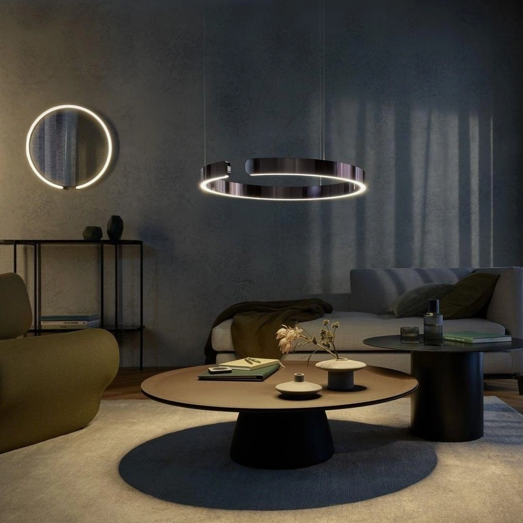 Multiple halo LED ring pendant lamps creating synchronized lighting design in modern kitchen
