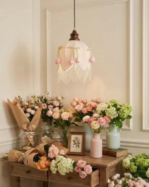 Hanavelle fabric tulip pendant light hanging in vintage-inspired bedroom with floral decor, warm ambient lighting through cream shade, romantic cottagecore interior