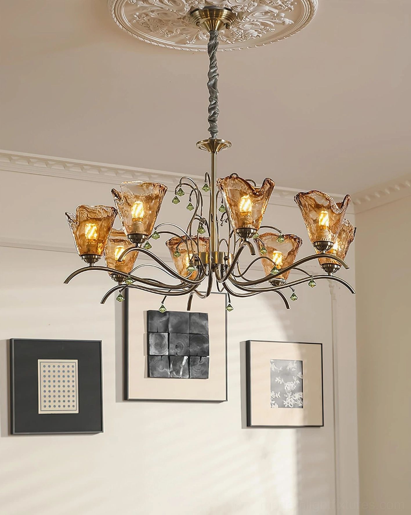 Vetraio tulip glass chandelier detail view, showing hand-blown amber shades and green crystal droplet accents with bronze metalwork