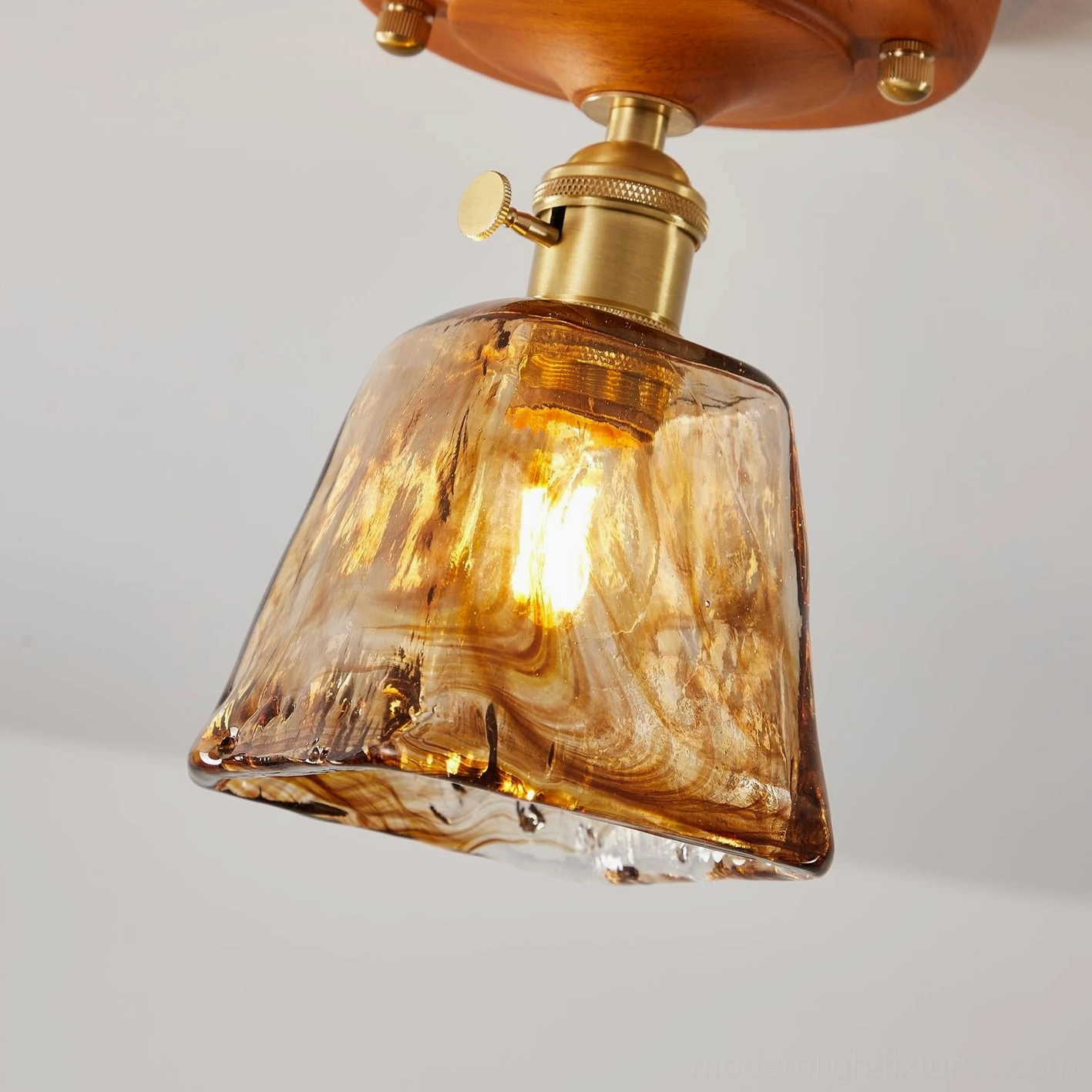 Hand-blown glass ceiling light fixture botanical green shade warm brass mounting