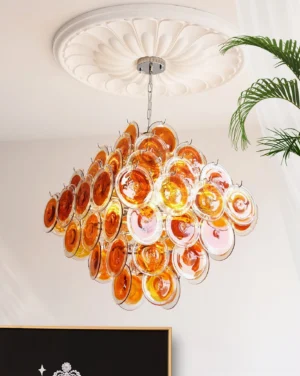 Modern hand-blown glass disc chandelier ceiling mounted in luxury American living room with low-angle view showing amber-pink tones