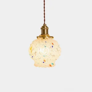 Kano Bubbles hand-blown glass pendant light with colorful speckles, frosted white shade, brass hardware, studio front view