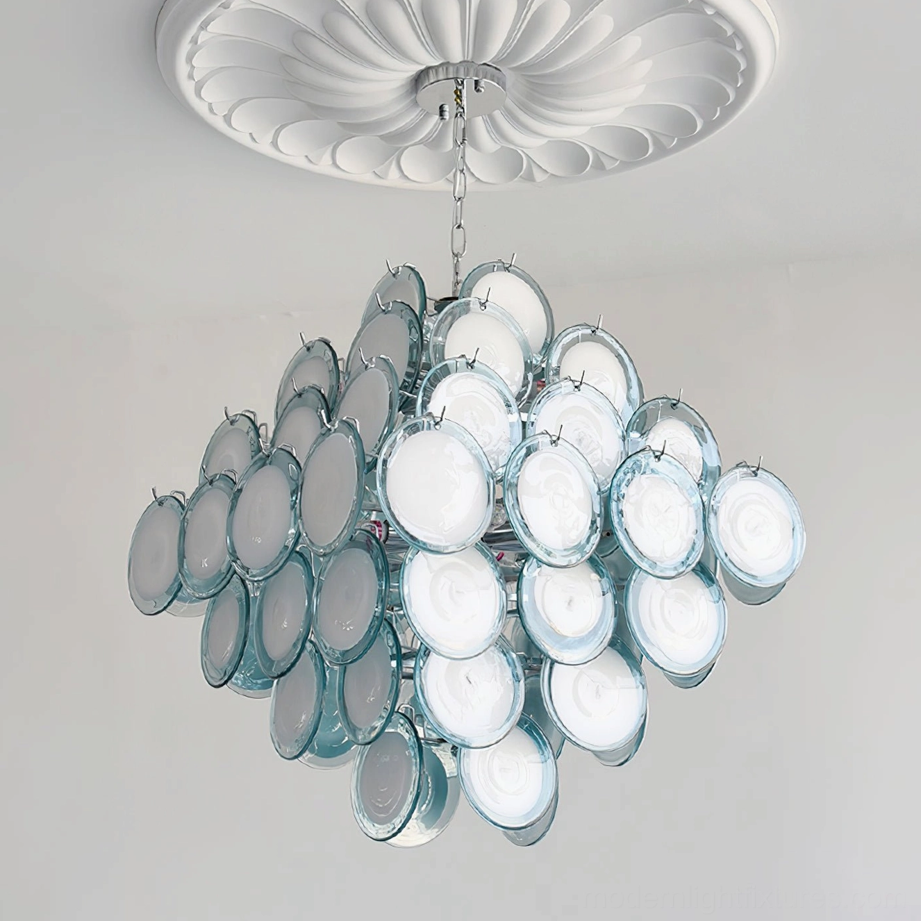 Hand-blown Murano glass disc chandelier detail showing individual glass elements and light diffusion properties