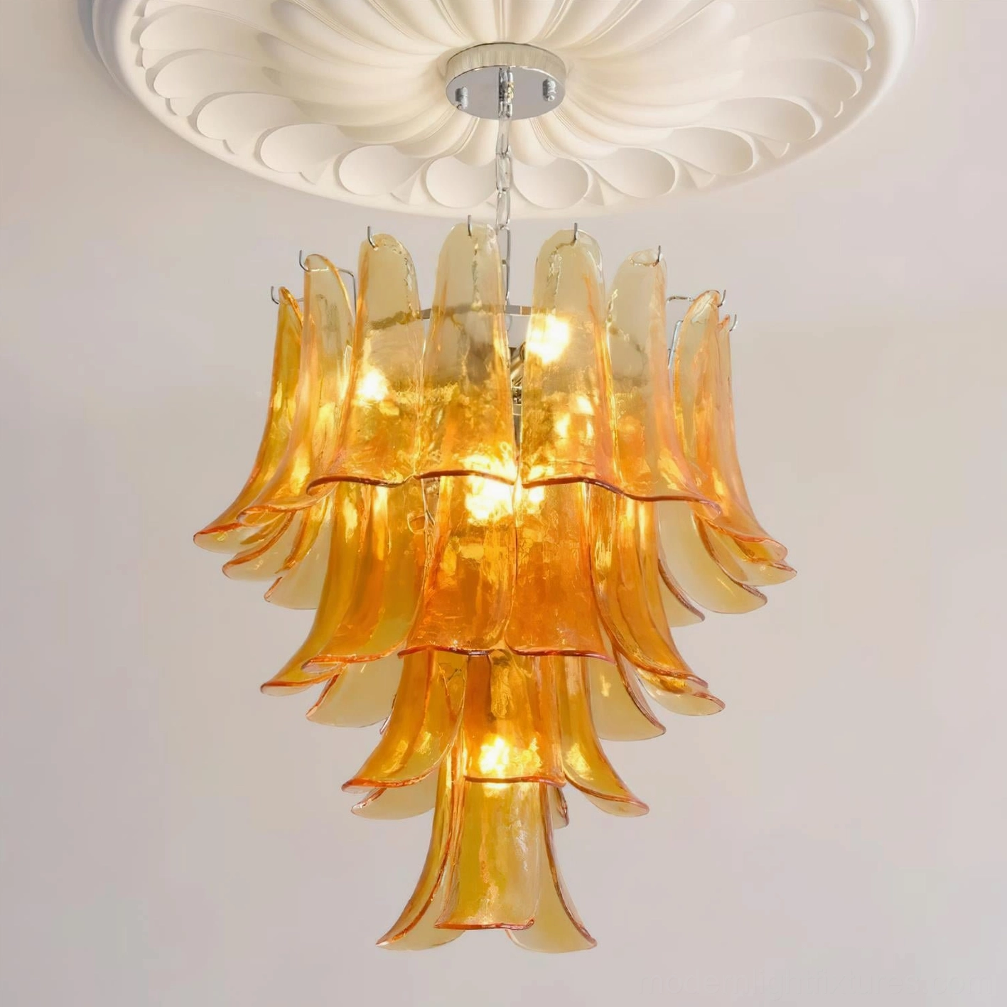 Hand-blown glass petal chandelier showing individual petal articulation and light refraction