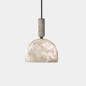 Hand-carved natural alabaster dome pendant light with matte black brass hardware, close-up studio shot
