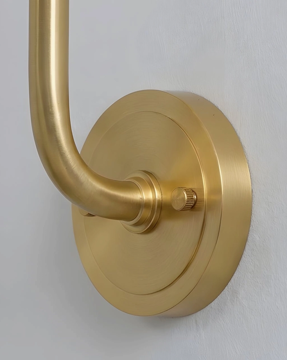 Lunelle hand-carved natural alabaster wall sconce with brass details, mid-century modern style