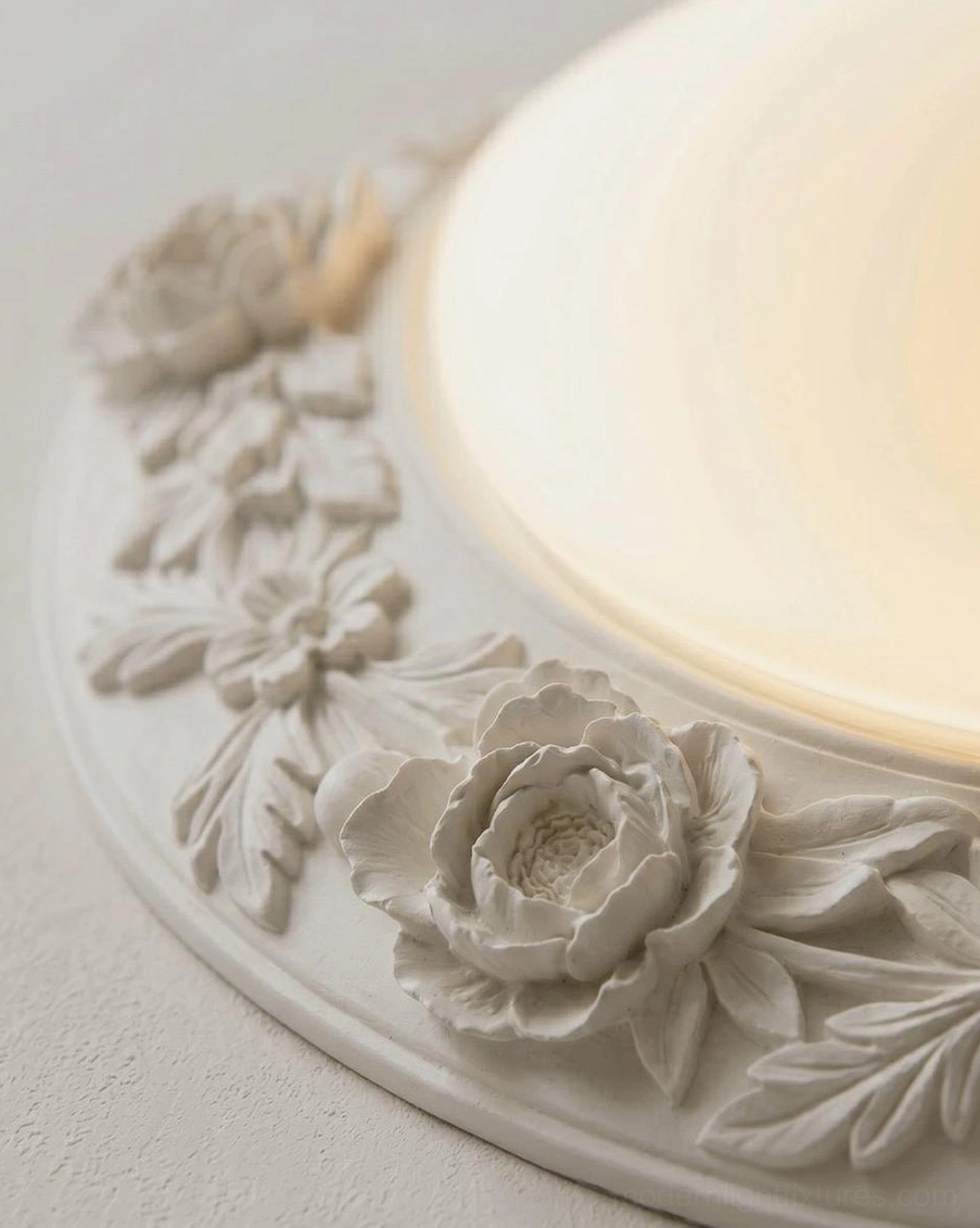 Hand-carved floral flush mount ceiling light in traditional home setting with classical architectural details and warm color palette