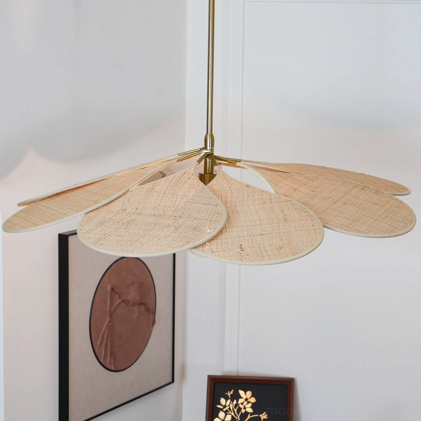 Hand-crafted rattan pendant lamp in bohemian interior with artisanal home decor accents