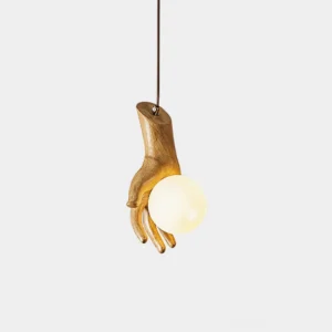 Hand of Victory sculptural pendant light with white resin hand cradling illuminated globe, studio front view