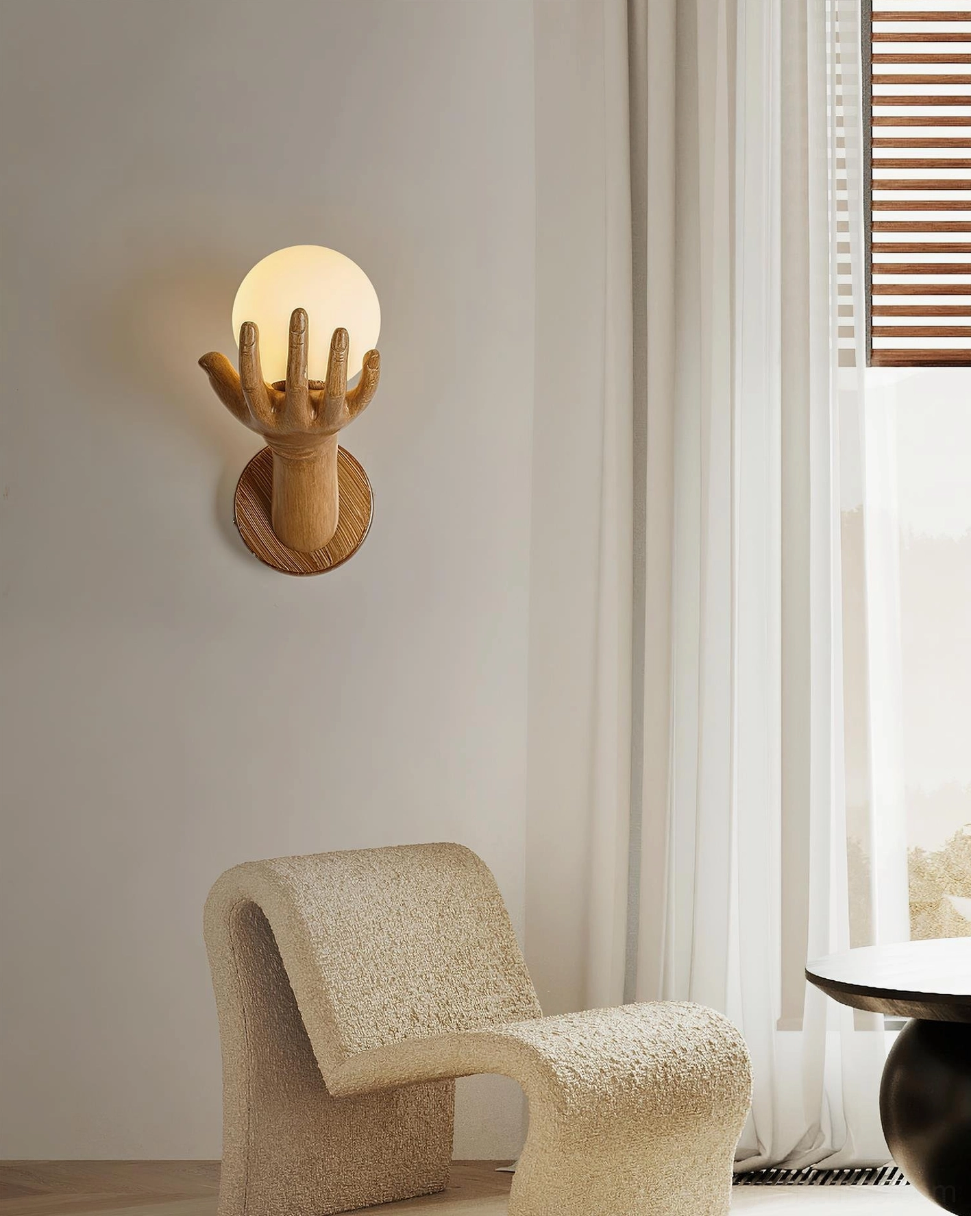 Hand of Victory wall sconce illuminated detail with frosted glass globe light effect