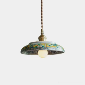Hand-painted ceramic saucer pendant light with brass E27 socket and twisted brown fabric cord, front studio view
