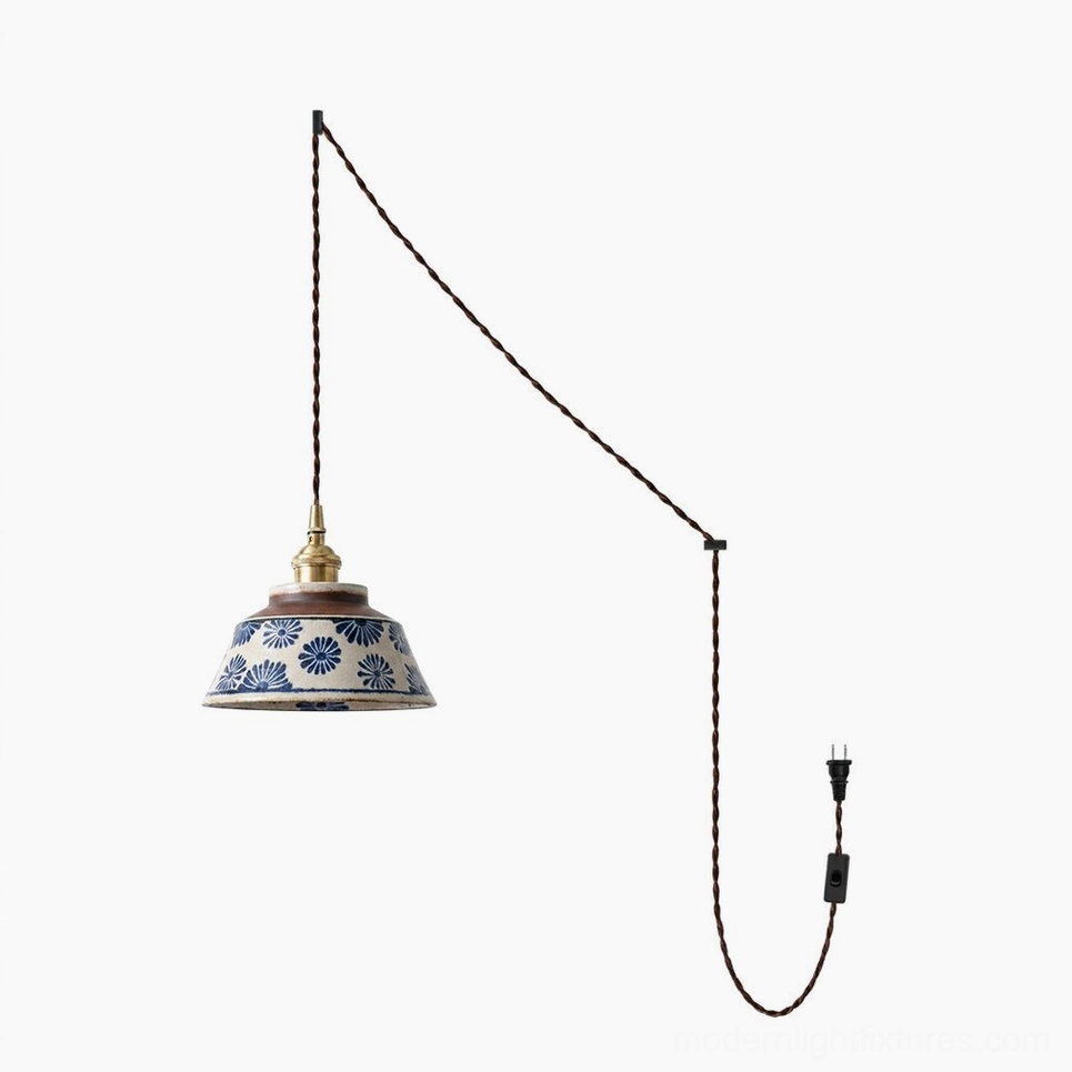 Kikyo hand-painted indigo ceramic pendant lamp front studio view on white background showing glaze details and brass socket