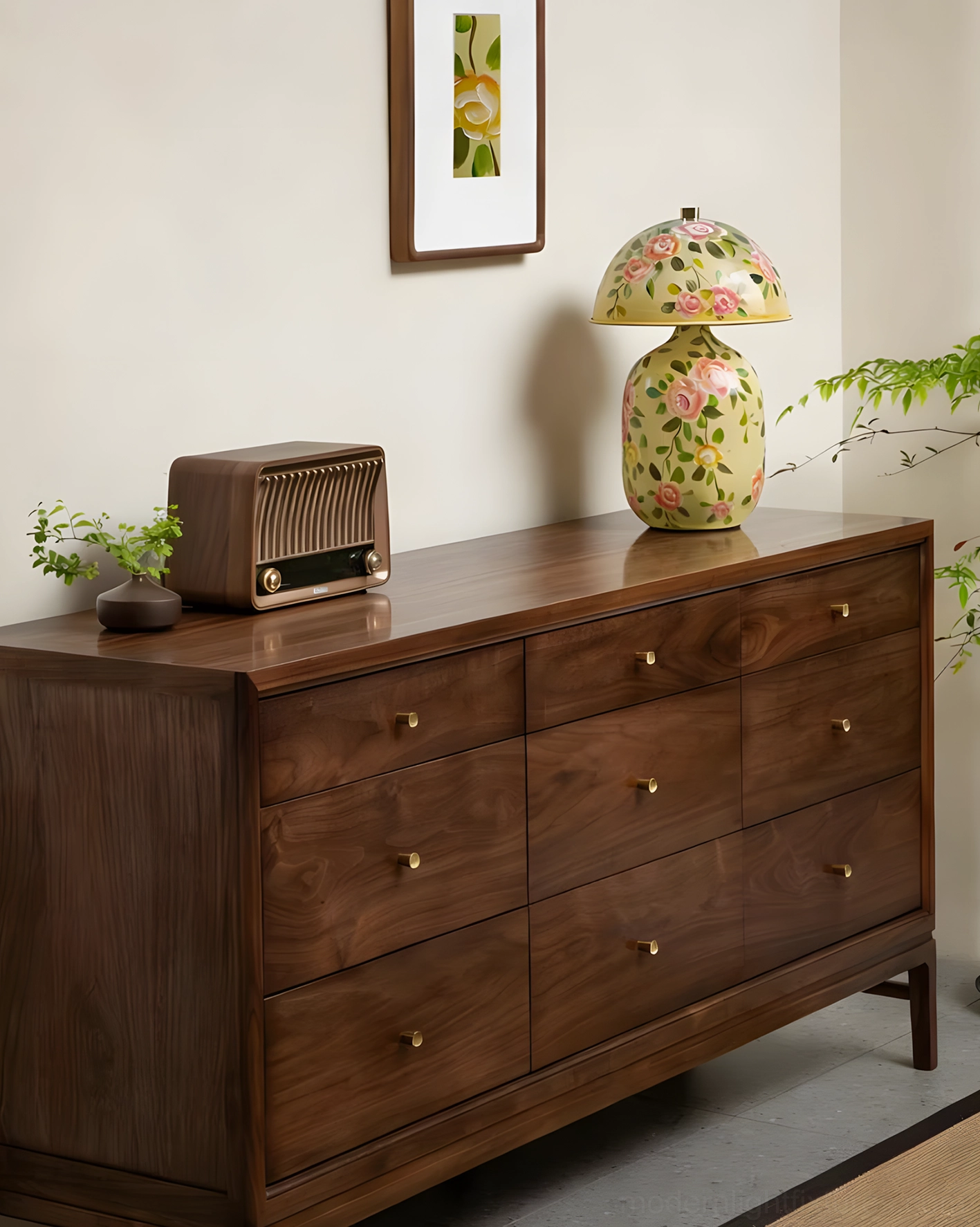 Hand-painted floral ceramic table lamp on vintage wood dresser in American bedroom decor style