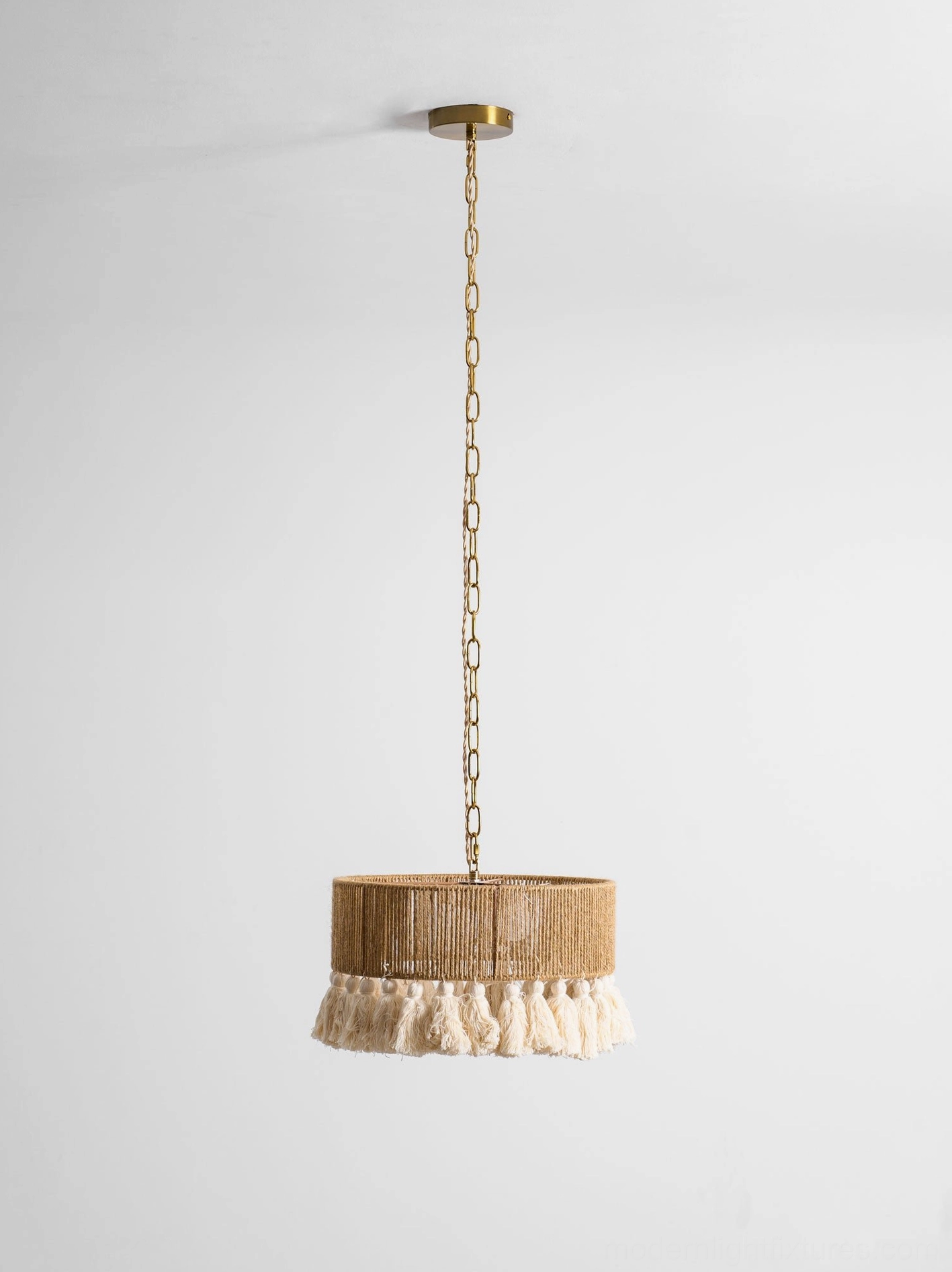 Hand-woven boho tassel pendant light showing construction quality and cotton materials